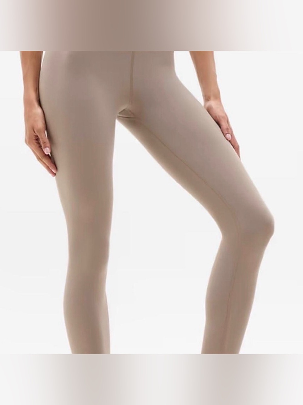 Athleta ultra High-Rise elation leggings 7/8 length. Tan in color. Size medium
